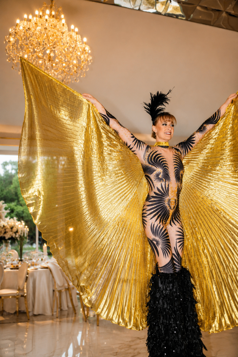 Gold wing performer entertaining guests at a luxury wedding reception
